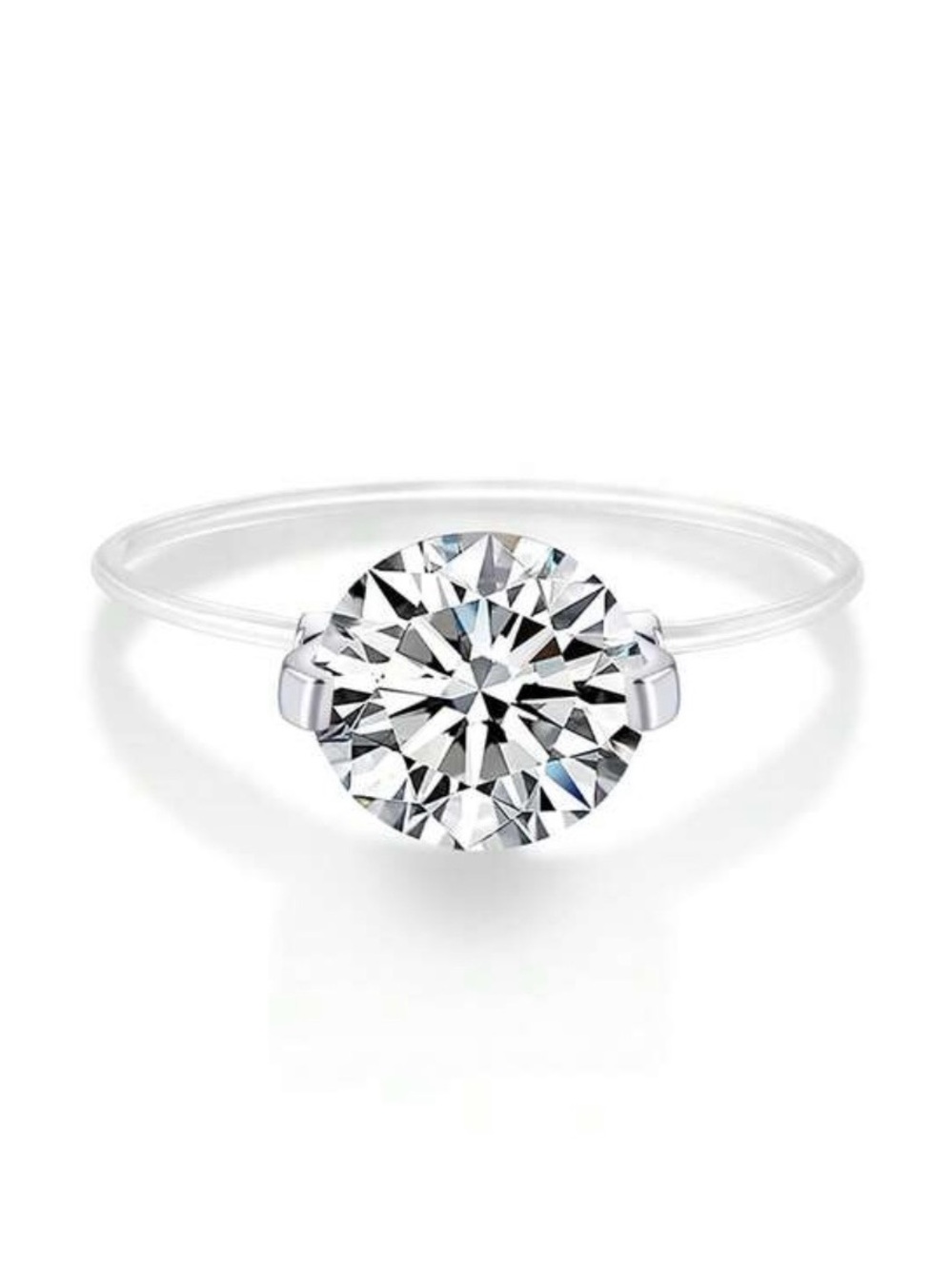 1 carat Moissanite ring with clear band in silver setting